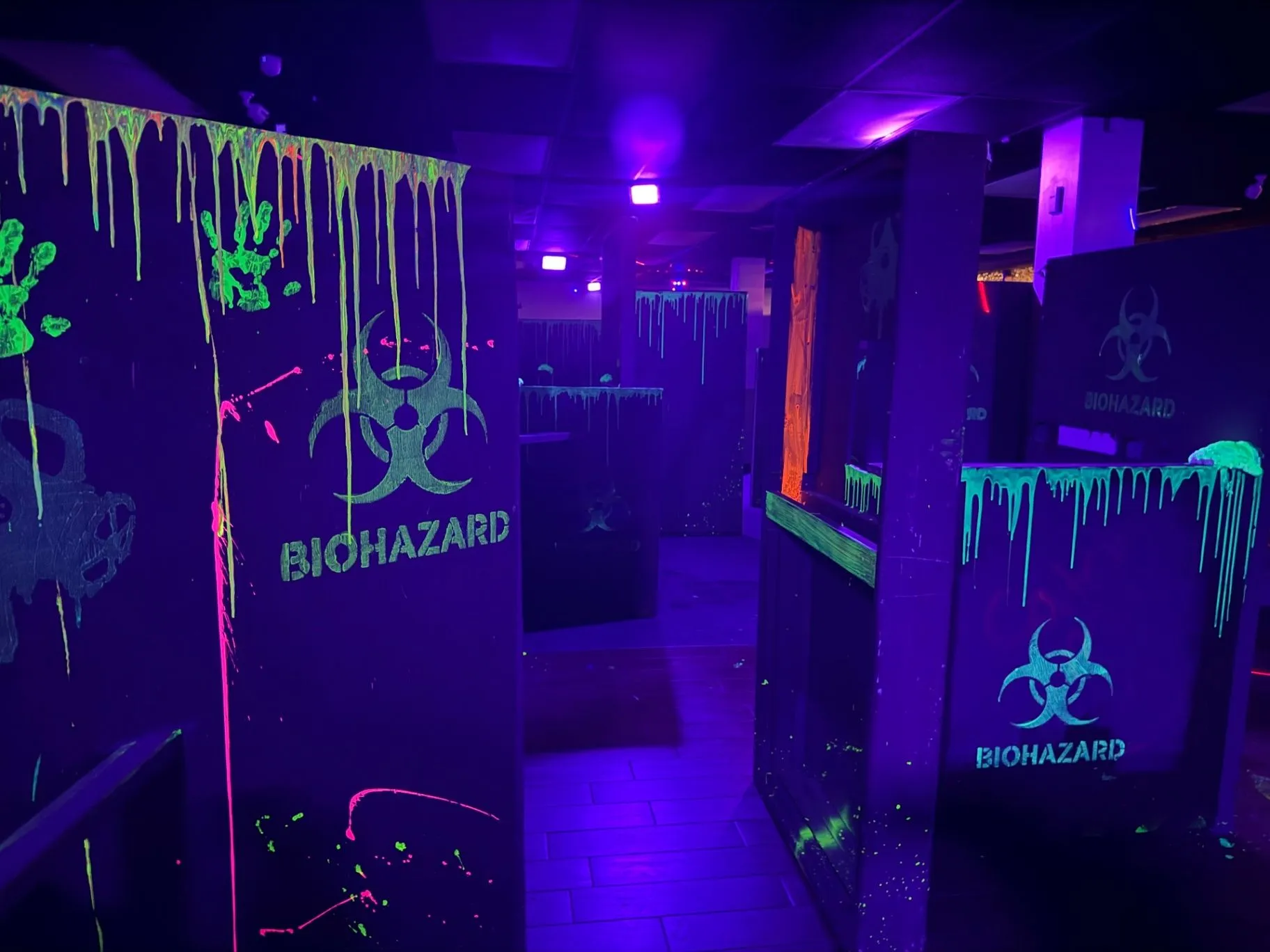 Wide view of Biohazard-marked obstacles inside the Toxic Wasteland arena